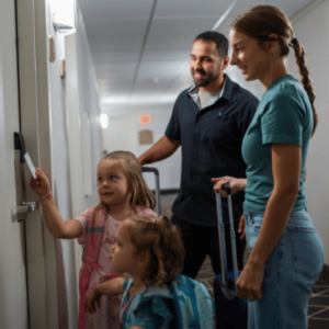 Family checking into their room at the Best Western