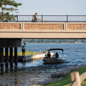 Boat going through the channel on Fairmont's Chain of Lakes 