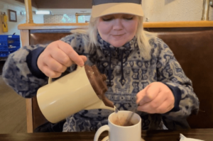 Girl making coffee at Edie's Restaurant in Fairmont Minnesota