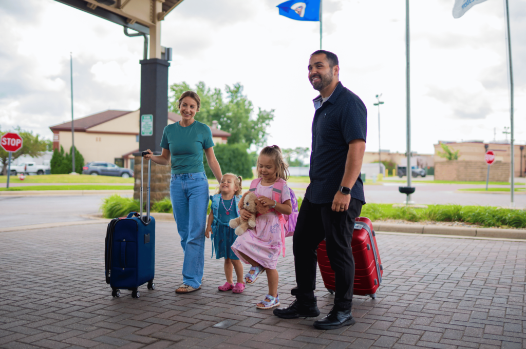 Family walking into the Fairmont Best Western in Southern Minnesota