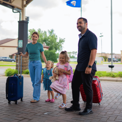 Family walking into the Fairmont Best Western in Southern Minnesota