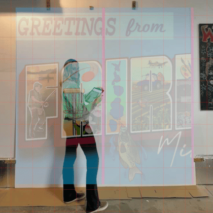 Teaser of photo of the Greetings from Fairmont Mural with the Artist Alexandra Hurney