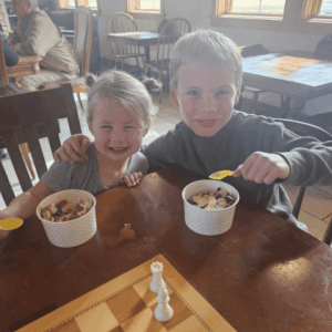 Kids at Graffiti Corner with there frozen yogurt bowls in Fairmont, Minnesota
