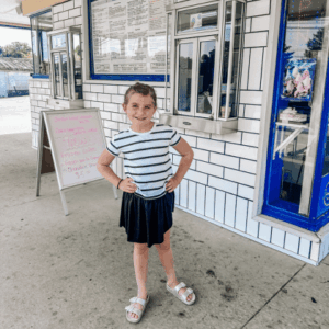 Girl posing in front of Dairy Freeze in Fairmont, MN