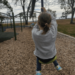 Girl playing at Gomsrud Park at Fairmont, MN