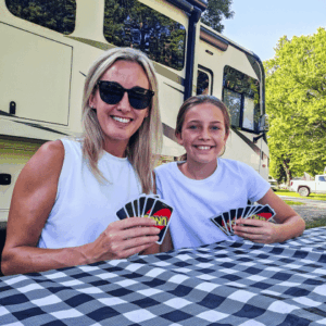 Family playing card games at flying goose campground near fairmont mn