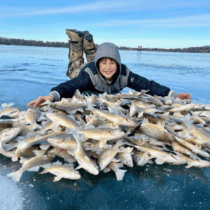 child posing with yellow bass on fairmonts chain of lakes